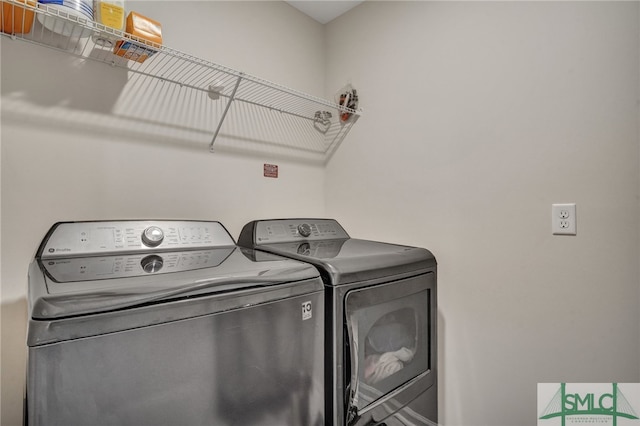 laundry area with washer and clothes dryer