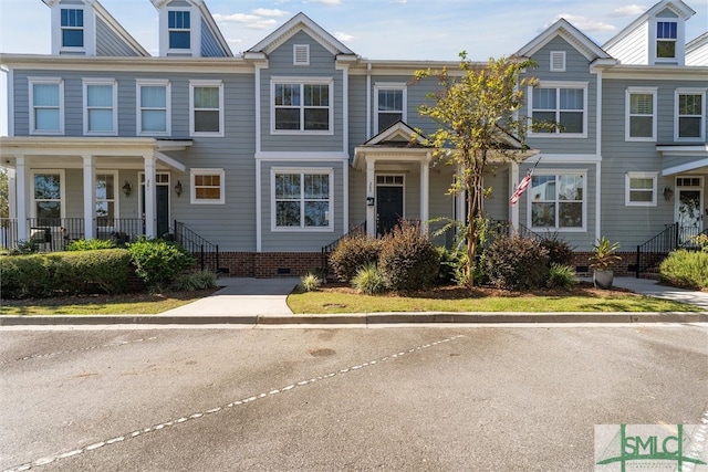 view of property with a porch