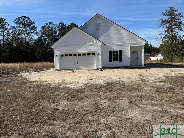 exterior space with a garage