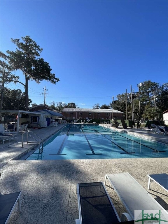 view of pool featuring a patio area