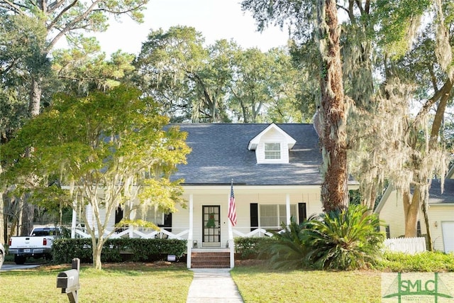 view of front of home with a front yard