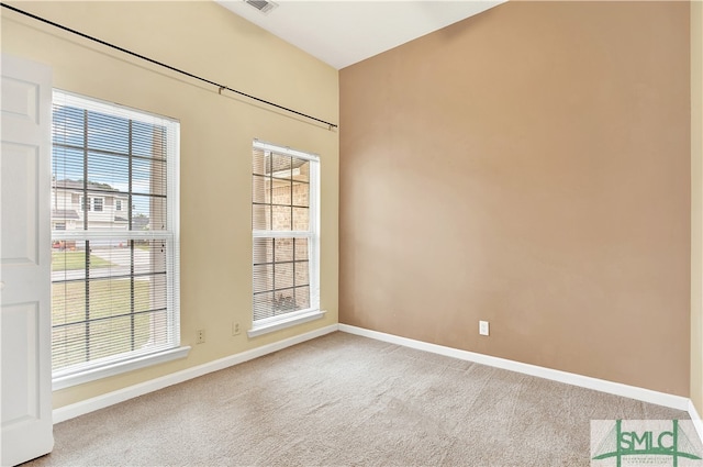 empty room featuring carpet floors