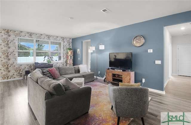 living room with wood-type flooring