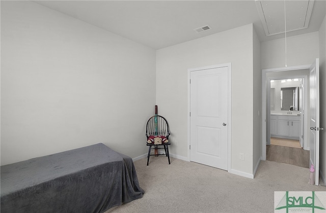 bedroom with light carpet