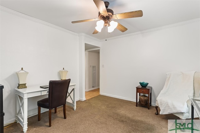 carpeted office with ceiling fan and ornamental molding