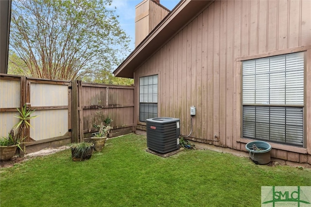 view of yard featuring central AC unit