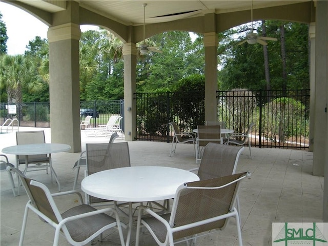 view of patio featuring ceiling fan