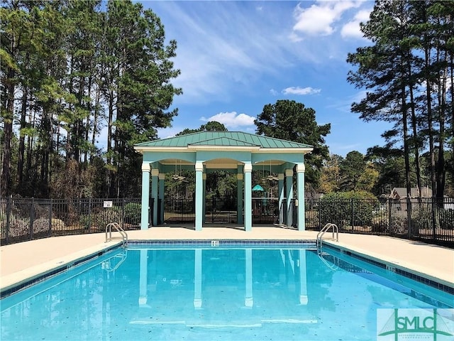 view of swimming pool with a gazebo