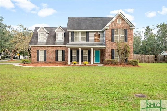 view of front of home with a front yard