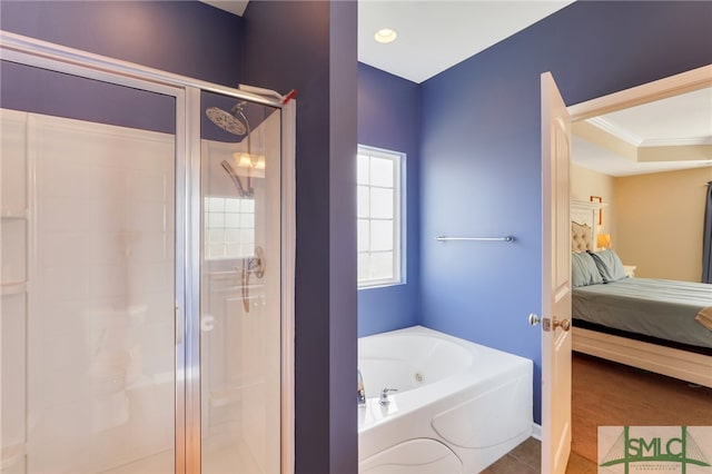 bathroom featuring crown molding and independent shower and bath