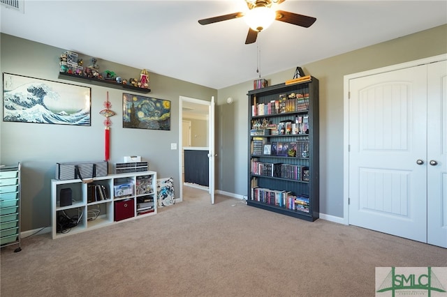 playroom featuring carpet floors and ceiling fan