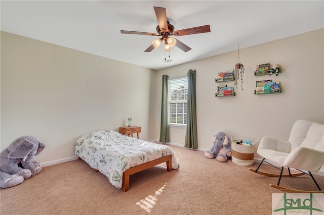 bedroom featuring light colored carpet and ceiling fan