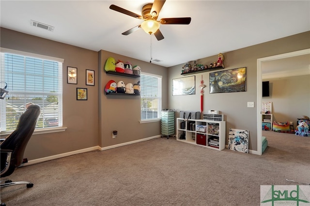 game room featuring carpet flooring and ceiling fan