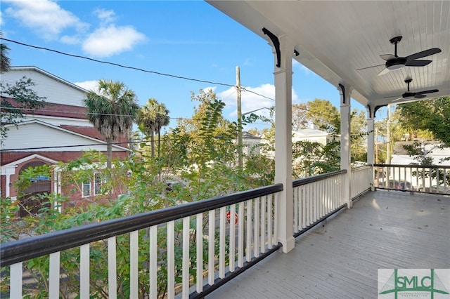 wooden terrace with ceiling fan