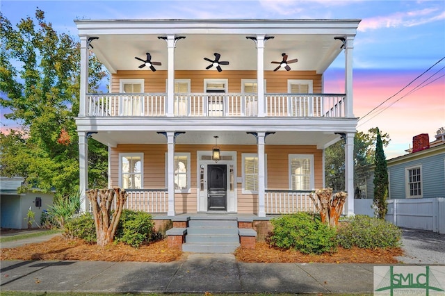 view of front of home featuring covered porch and ceiling fan