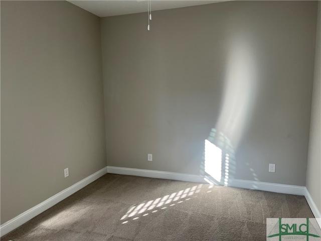 unfurnished room with carpet