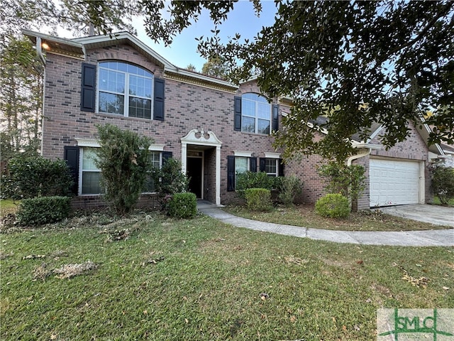 view of front facade featuring a front yard and a garage