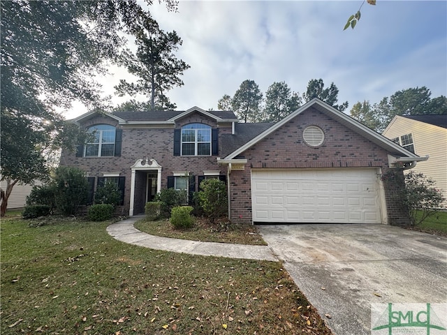 view of front of property with a front lawn and a garage