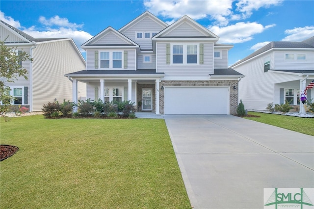 view of front of house with a front yard and a garage