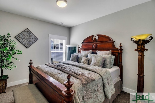 bedroom featuring light colored carpet