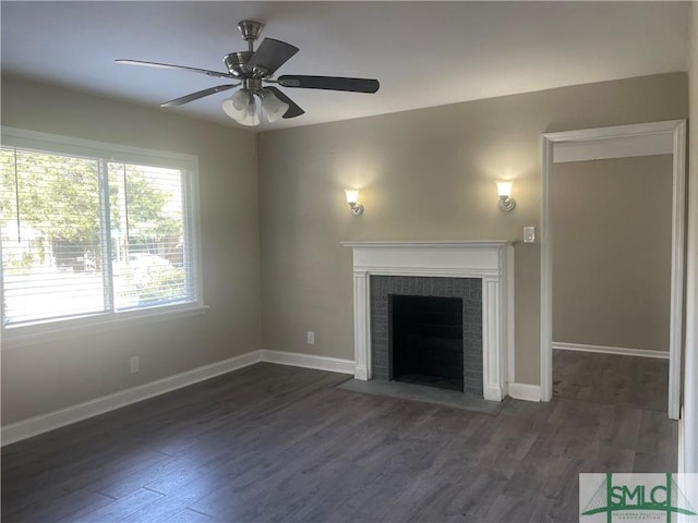202 Forrest Ave, Savannah, GA 31404 - unfurnished living room featuring a ceiling fan, dark wood-style floors, a fireplace with flush hearth, and baseboards