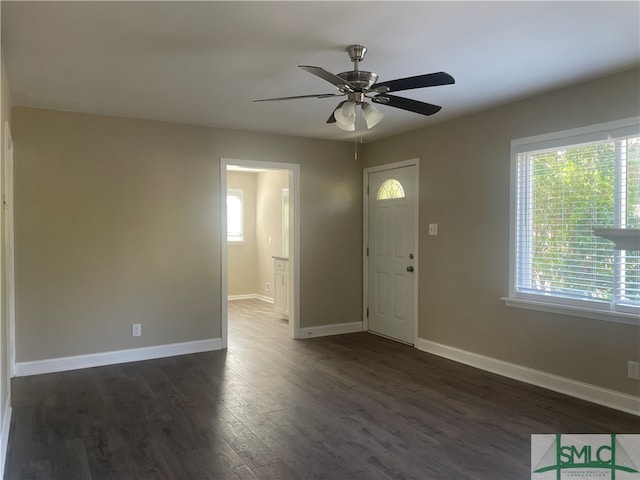 foyer with ceiling fan and dark hardwood / wood-style floors