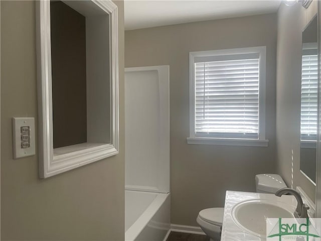 202 Forrest Ave, Savannah, GA 31404 - full bathroom featuring toilet, vanity, and baseboards