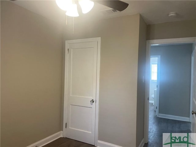 202 Forrest Ave, Savannah, GA 31404 - unfurnished bedroom featuring dark wood-style flooring and baseboards