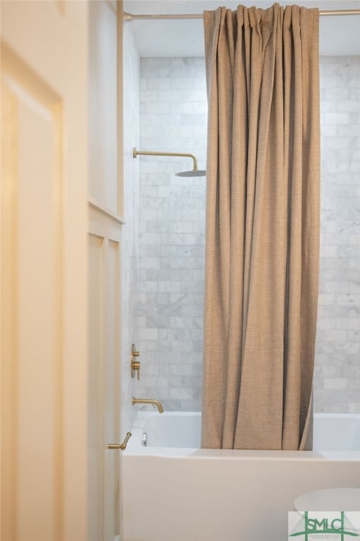 bathroom featuring shower / bath combination with curtain