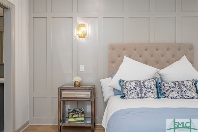 bedroom featuring hardwood / wood-style flooring