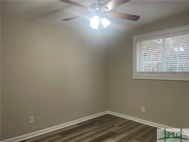 unfurnished room featuring ceiling fan and dark hardwood / wood-style flooring