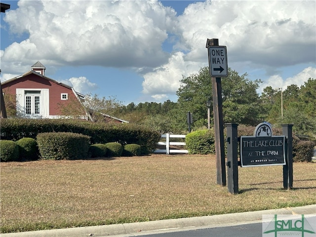 surrounding community featuring a lawn