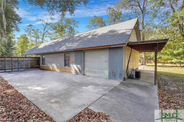 garage with a carport