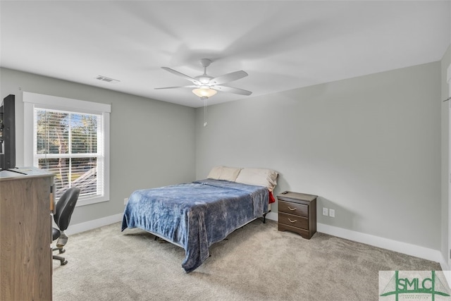 5261 Mill Branch Club Rd, Pembroke, GA 31321 - carpeted bedroom featuring baseboards and ceiling fan