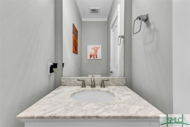 5261 Mill Branch Club Rd, Pembroke, GA 31321 - bathroom featuring crown molding and vanity