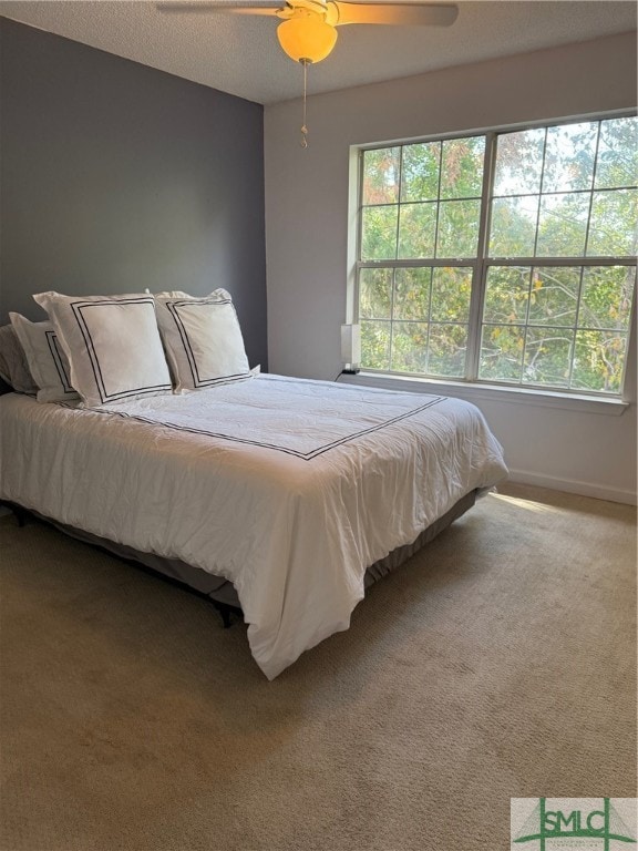 bedroom featuring carpet flooring and ceiling fan