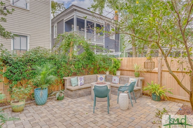 view of patio with a fire pit