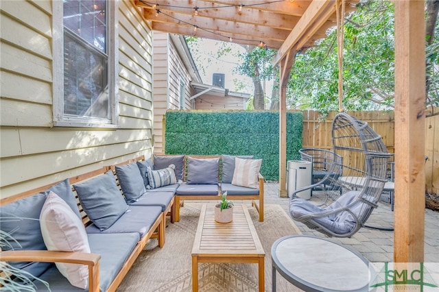 view of patio featuring a pergola and an outdoor living space