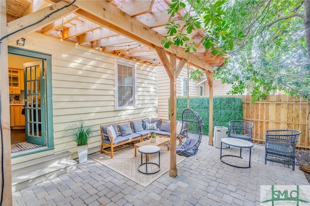 view of patio featuring a pergola and an outdoor hangout area