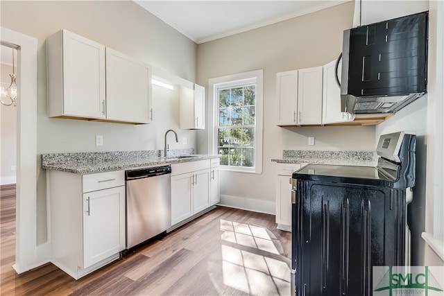 kitchen with white cabinetry, sink, and stainless steel appliances