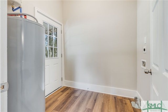 entryway with hardwood / wood-style flooring