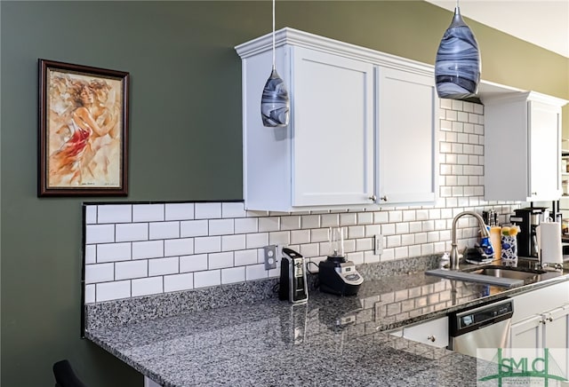 kitchen featuring white cabinetry, dishwasher, sink, and hanging light fixtures