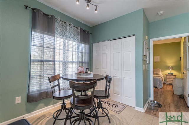 dining space featuring baseboards