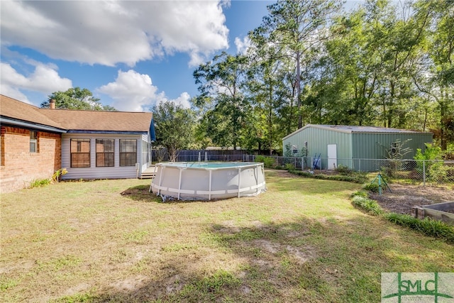 view of yard featuring a fenced in pool