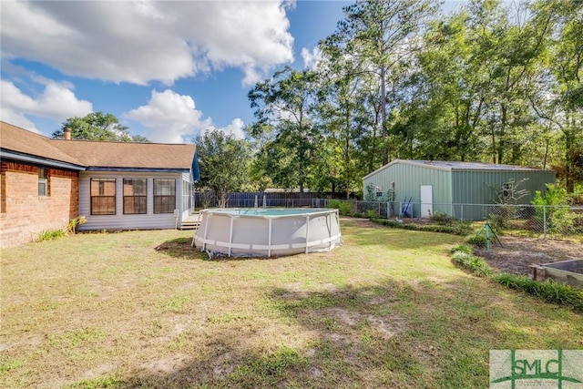 view of yard featuring a fenced in pool