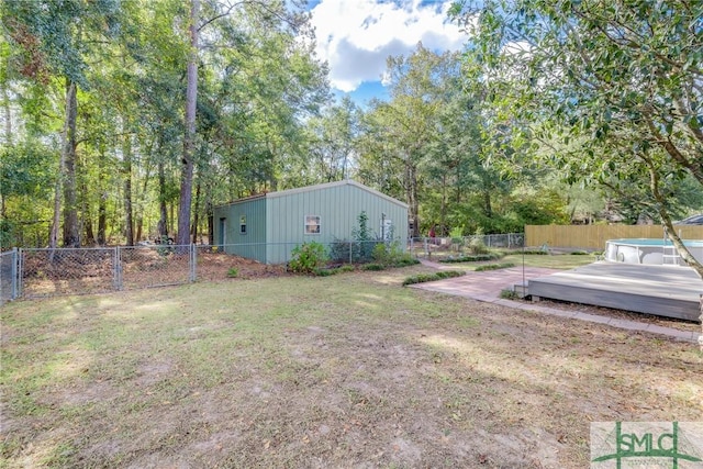 view of yard featuring a wooden deck