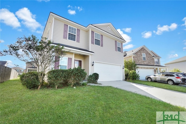 view of front of property featuring a front lawn and a garage