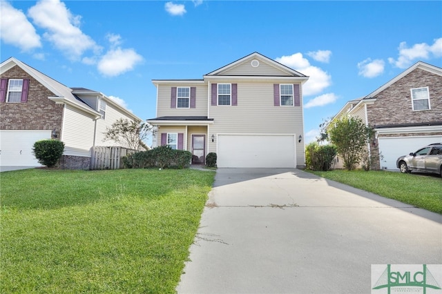 view of front property featuring a front yard and a garage