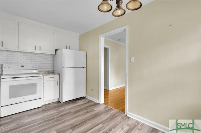 kitchen with white appliances, light hardwood / wood-style floors, white cabinetry, and decorative backsplash