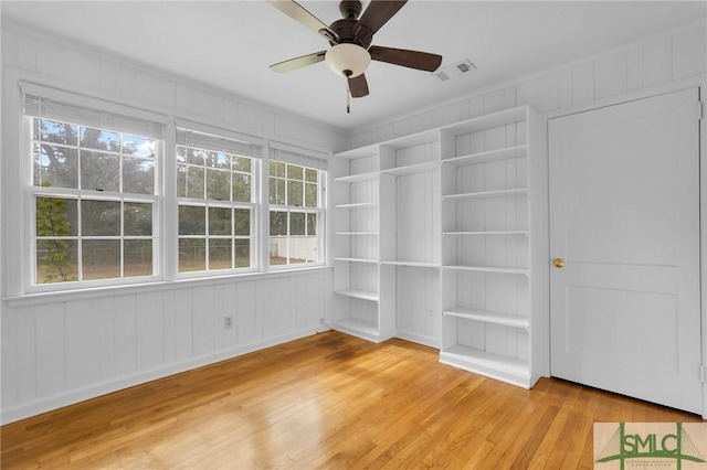 interior space featuring ceiling fan and hardwood / wood-style flooring